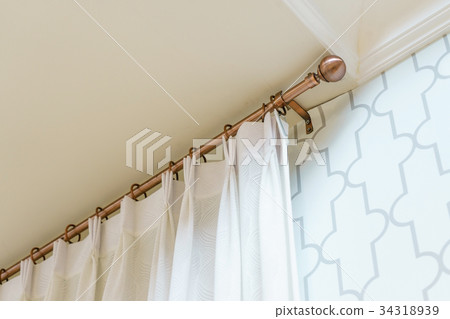 The white curtains with ring-top rail  34318939