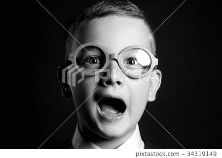 screaming child in glasses screaming child in glasses 34319149