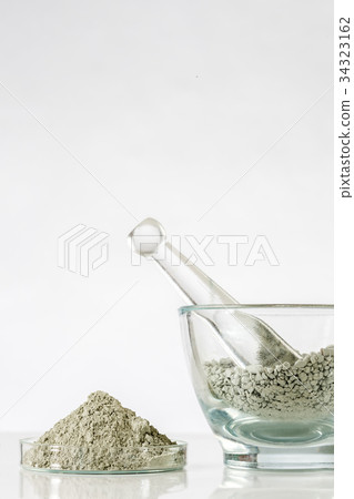 Green clay in glass mortar Green clay in glass mortar 34323162