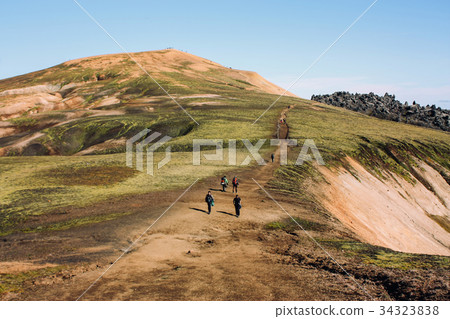 Icelandic landscape with mountain tourist  34323838