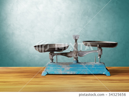 old classic vintage scale on wooden table, justice 34325656