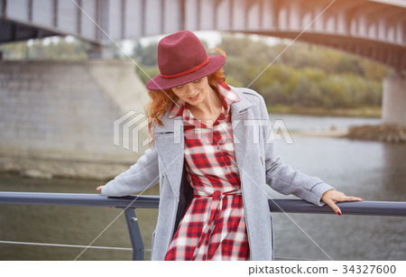 Woman in autumn city 34327600