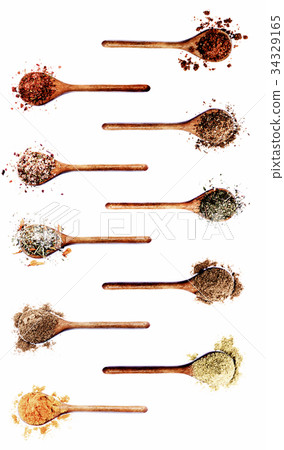 Collection of Spices in Wooden Spoons 34329165