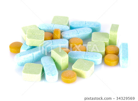 Pills on a white background Pills on a white background 34329569