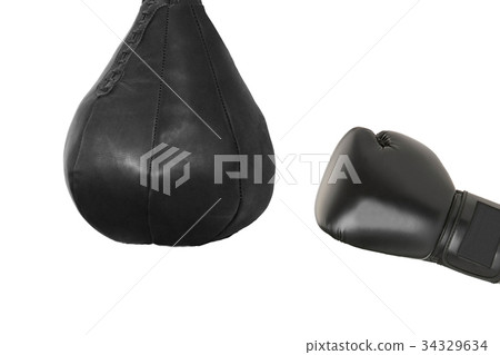 Boxing glove and a punching bag isolated 34329634