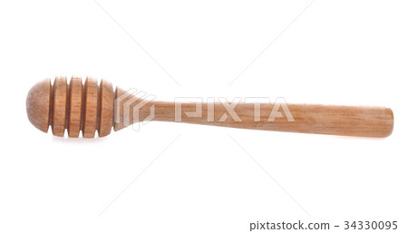 wooden honey stick isolated on white background wooden honey stick isolated on white background 34330095