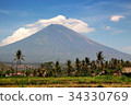 Active volcano Gunung Agung in Bali at sunset. 34330769