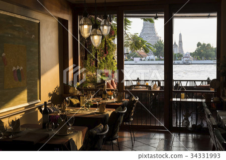 Restaurant overlooks Wat Arun at sunset, Bangkok 34331993
