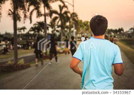 Asian men are jogging 34333967