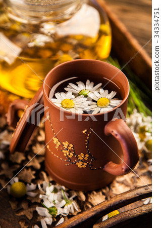 Cup of chamomile tea 34334751