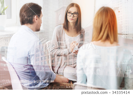 Professional female psychologist conducting a 34335414
