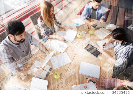 Professional young coleagues working in the office 34335435