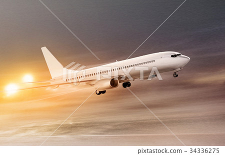 airplane in snowstorm at night airplane in snowstorm at night 34336275