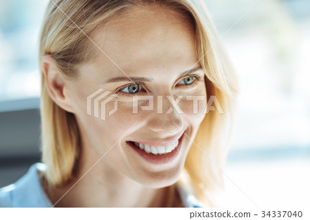 Close up of beautiful smiling fair-haired woman 34337040