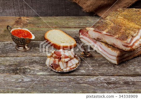 Ukrainian salo a wooden table Ukrainian salo a wooden table 34338909