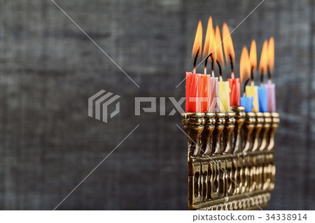 Brightly Glowing Hanukkah Menorah - Shallow Depth Brightly Glowing Hanukkah Menorah - Shallow Depth 34338914