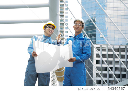 Two Engineer or Architect discuss on Building Two Engineer or Architect discuss on Building 34340567