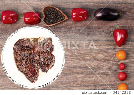 grilled T-bone beef steak viewed from above 34342238