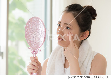 Trouble of skin Young Japanese woman Trouble of skin Young Japanese woman 34343181