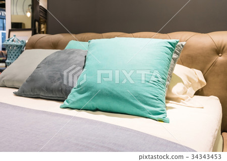 Bed maid-up with clean white pillows and bed sheet 34343453