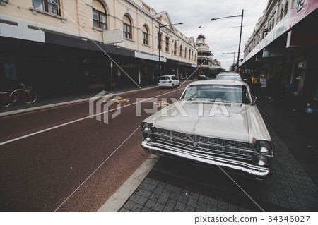Retro car and cityscape 34346027