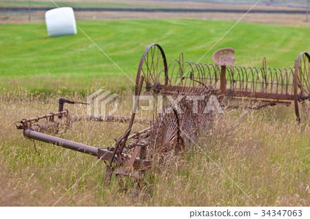 Rusty plows on a field of Iceland Rusty plows on a field of Iceland 34347063
