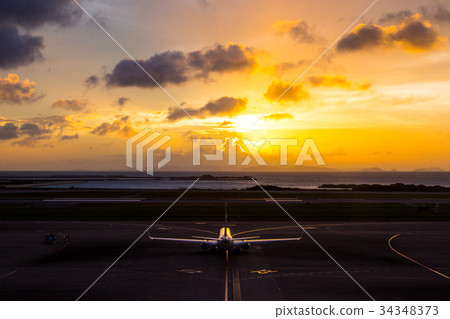 Sunset sky and plane 34348373