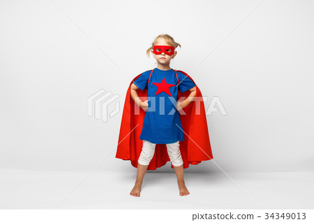 Very excited little girl dressed like superhero Very excited little girl dressed like superhero 34349013