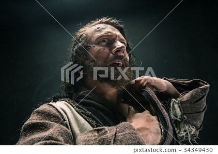 Portrait of a brutal bald-headed viking in a Portrait of a brutal bald-headed viking in a 34349430