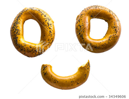 stylized face of bagels on the isolated background stylized face of bagels on the isolated background 34349606
