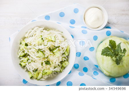 Salad with kohlrabi, cucumber and dill. Salad with kohlrabi, cucumber and dill. 34349696