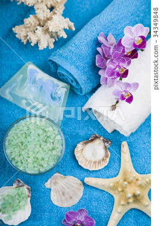 Spa treatments on a blue towel Spa treatments on a blue towel 34349848