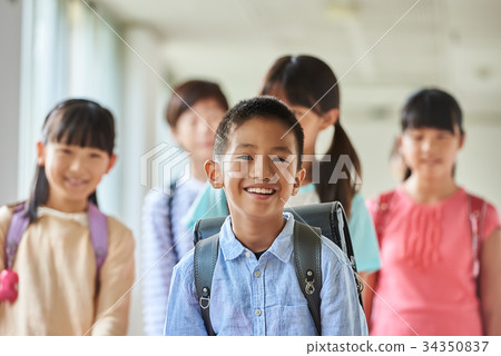 Elementary school attendance at school corridor 34350837