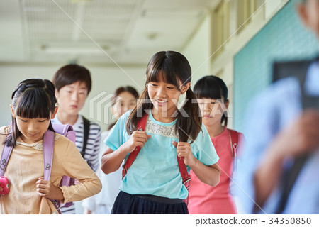 Elementary school attendance at school corridor Elementary school attendance at school corridor 34350850
