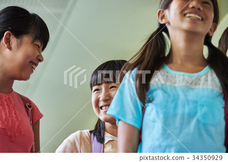 Elementary school attendance at school corridor Elementary school attendance at school corridor 34350929