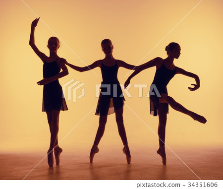 Composition from silhouettes of three young 34351606