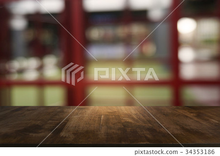 image of wooden table front of blurred background image of wooden table front of blurred background 34353186