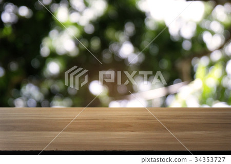 Empty dark wooden table blurred background Empty dark wooden table blurred background 34353727