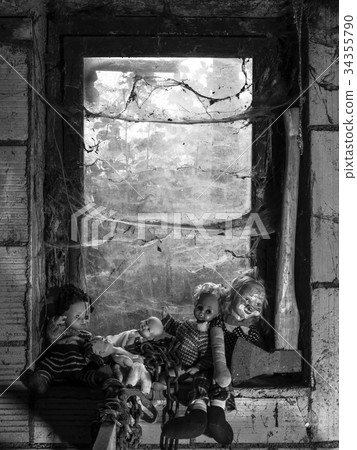 Scary dolls and an axe by the window 34355790