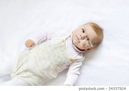 Portrait of cute baby girl wearing vintage clothes 34357924