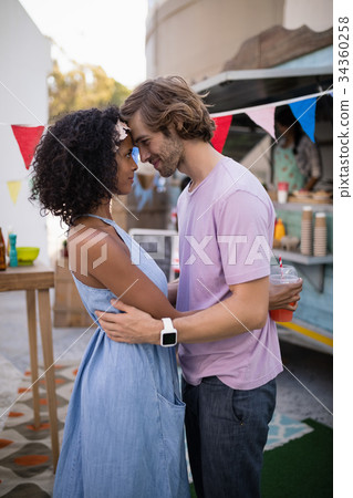 Romantic couple embracing each other Romantic couple embracing each other 34360258