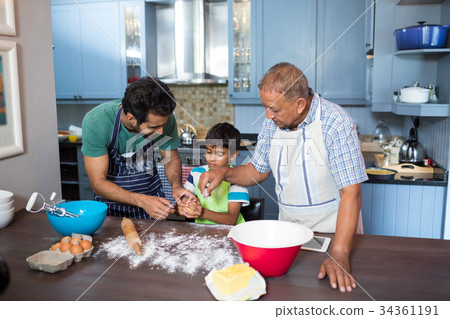 High angle view of family preparing food High angle view of family preparing food 34361191
