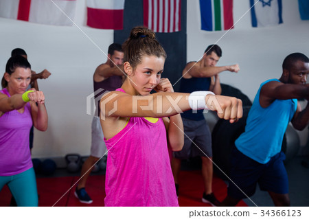 Young athletes practicing boxing 34366123