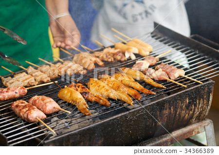 Grilled chicken wings, grilled chicken roasts  Grilled chicken wings, grilled chicken roasts  34366389