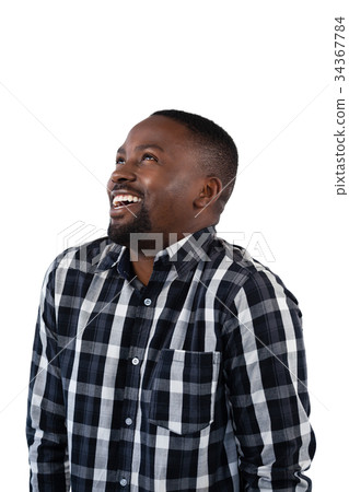 Man standing against white background Man standing against white background 34367784