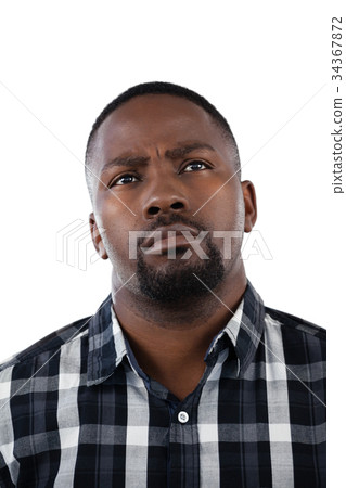Man standing against white background 34367872