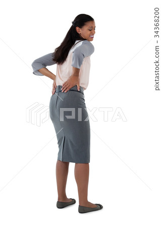 Businesswoman having an backache Businesswoman having an backache 34368200