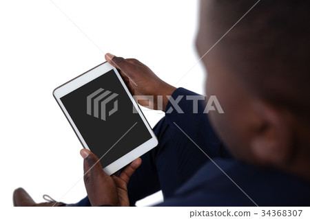 Businessman using digital tablet 34368307