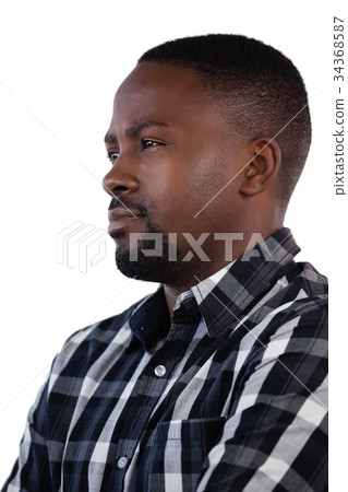Man standing against white background Man standing against white background 34368587