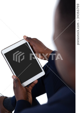 Businessman using digital tablet 34368769